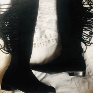 Black suede Stuart Weitzman over-the-knee boot.